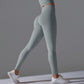 Seamless Solid Peach Sports Trousers for Women - Tight Running Fitness Yoga Pants with High Waist and Butt-Lifting Design