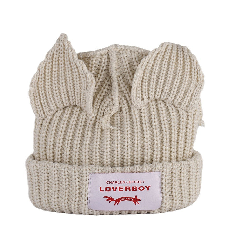 Double-layer thickened pig ear wool hat autumn and winter warm solid color knitted hat